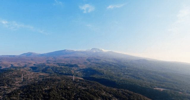 Vast mountain landscape under a clear sky