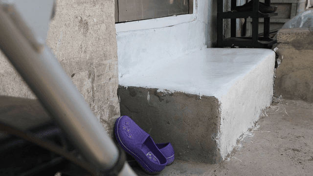 Purple rubber shoes on stairs