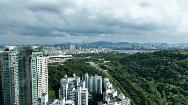 Cityscape with high-rise buildings and greenery