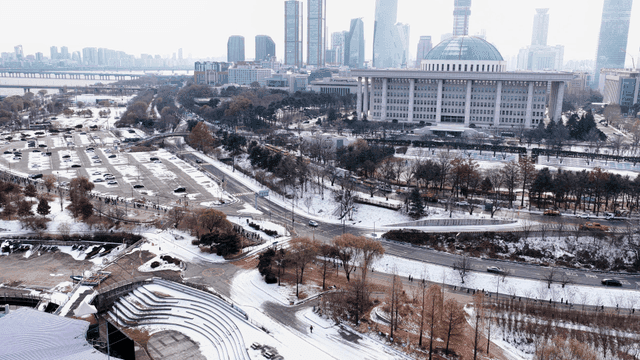 Snow-covered city landscape and government buildings