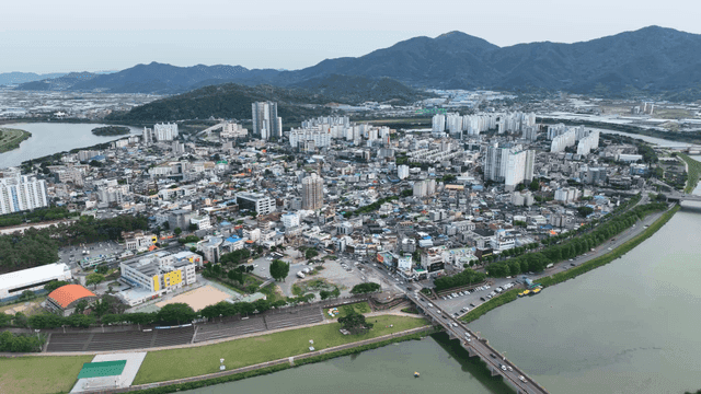 Sprawling cityscape with mountains