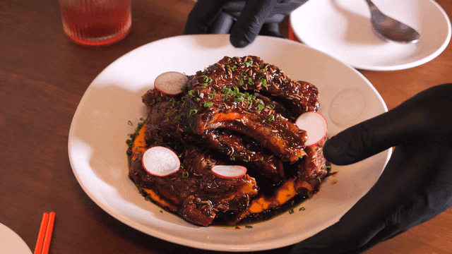 Seasoned ribs garnished with scallions