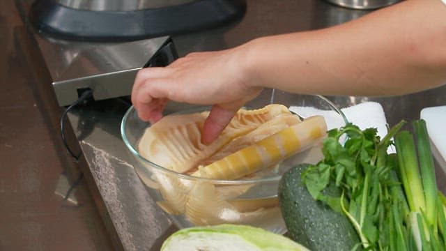 Preparing bamboo shoots with fresh vegetables