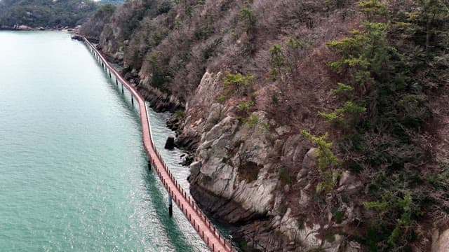 Scenic coastal walkway along rocky cliffs