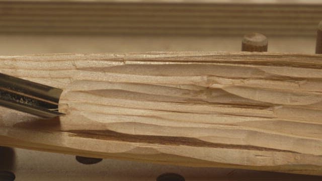 Wood carving with a chisel