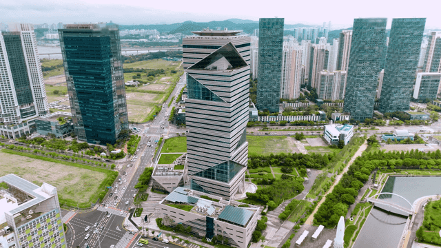 Modern skyscrapers and green spaces