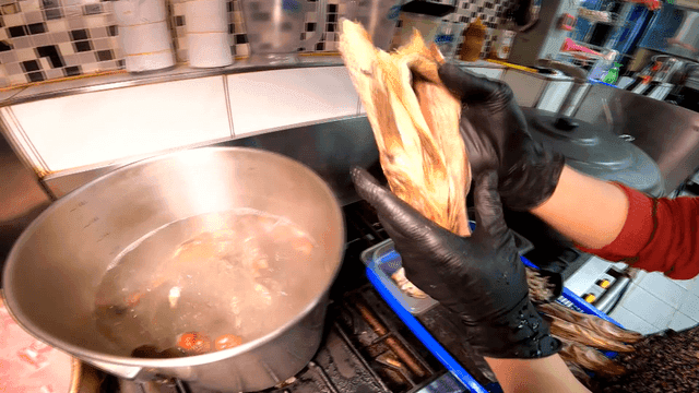 Dried seafood added to broth in kitchen