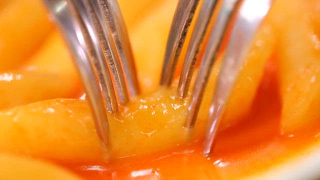 Spicy tteokbokki with forks