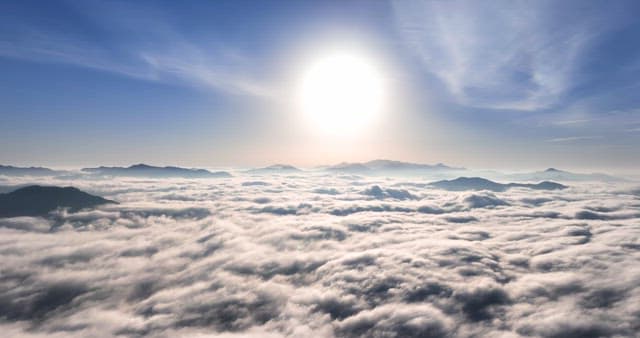 Sunrise over clouds