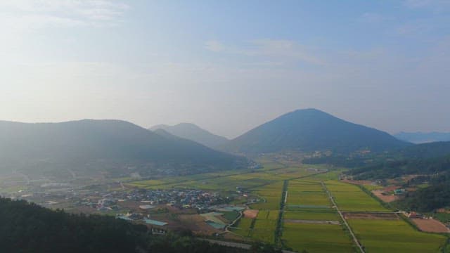 Rural village surrounded by mountains