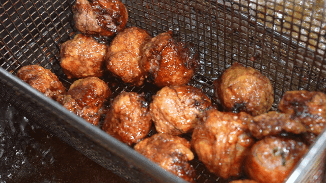 Chicken skin dumplings fried in hot oil