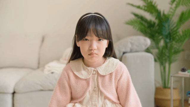 Young girl sighing