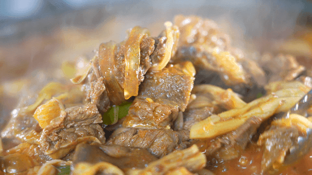 Braised beef short ribs with meat and vegetables