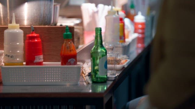 Street food stall with various condiments