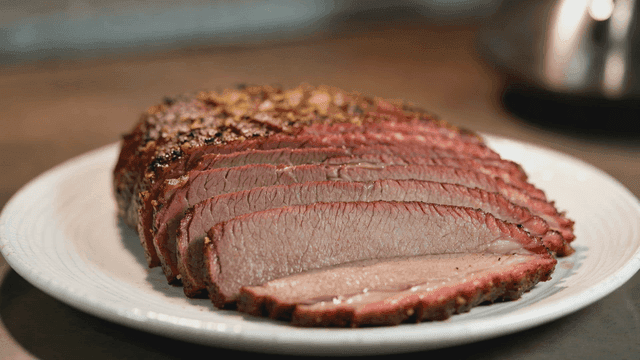 Sliced roast beef on a white plate