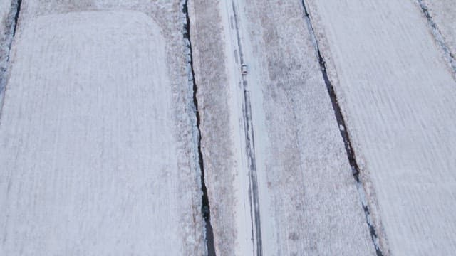 Car driving on a snowy road