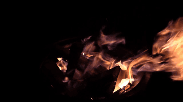 A campfire burning with bright flames