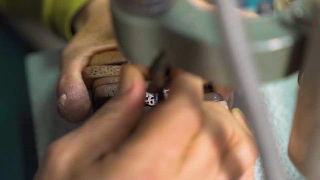 Craftsman Carving Intricate Patterns