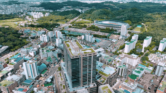 Vibrant cityscape with surrounding green space