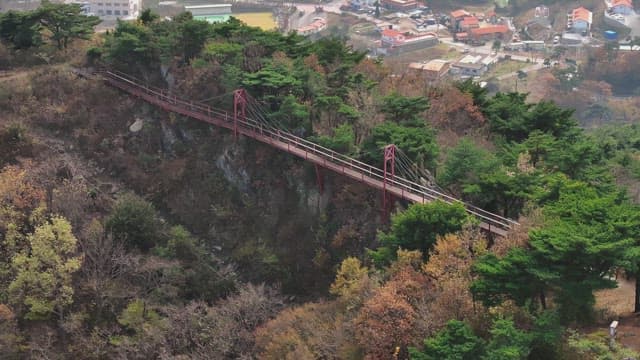 Sky Bridge Hanging Between Autumn Mountains