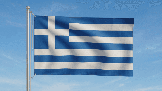 Greek flag fluttering under clear sky