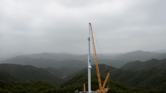 Crane in mountainous landscape