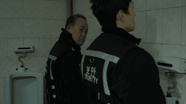 Security guards in a restroom