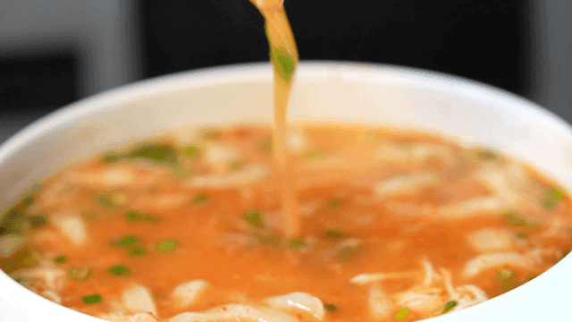 Chicken kalguksu with spicy seasoning