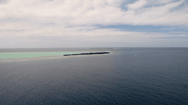 Tranquil island surrounded by blue sea