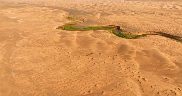 Desert with green valleys