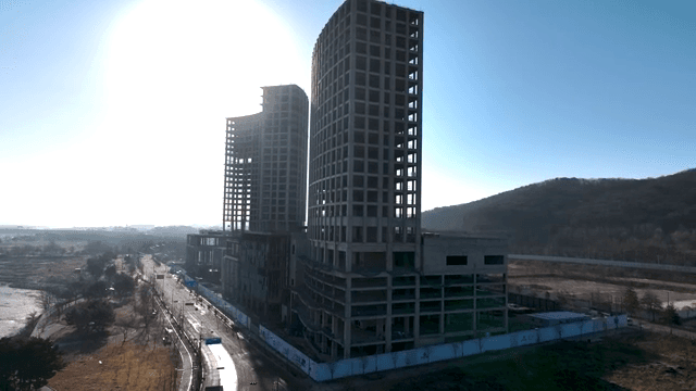 Unfinished building near the mountain