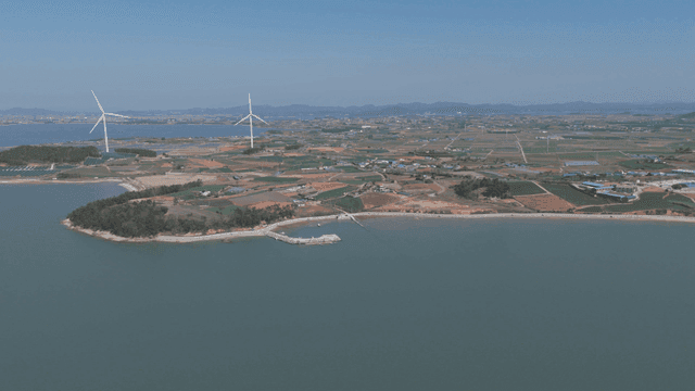 Coastal area with wind turbines