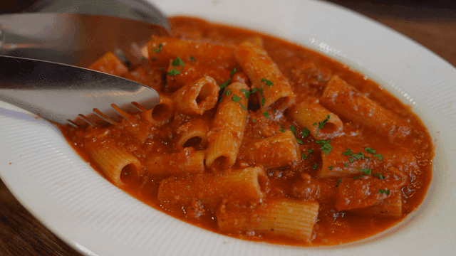 Delicious pasta in rich tomato sauce