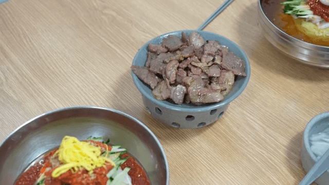 Grilled meat served with Cold Buckwheat Noodles