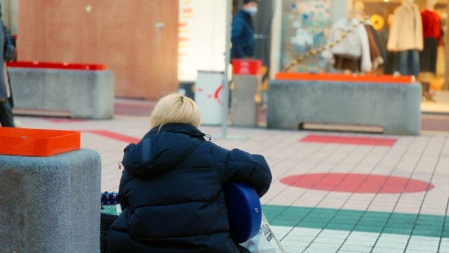 Street musician playing guitar in hongdae street