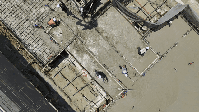 Concrete being poured at a construction site