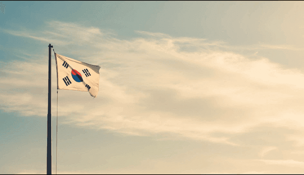 Korean flag waving against a clear sky