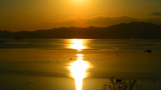 Serene Sunset Over Calm Seaside