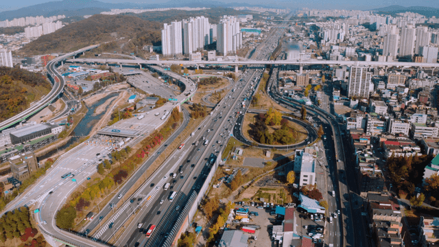 A bustling city with highways and skyscrapers