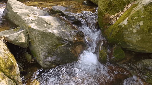 Small waterfall flowing over rocks