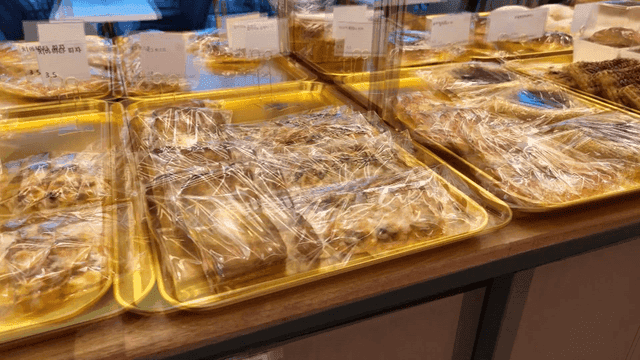 Various breads displayed on trays