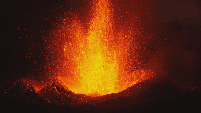 Erupting volcano with glowing lava
