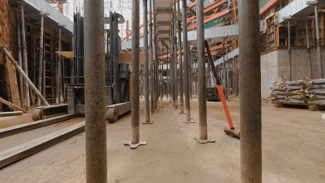 Construction site with scaffolding and tools