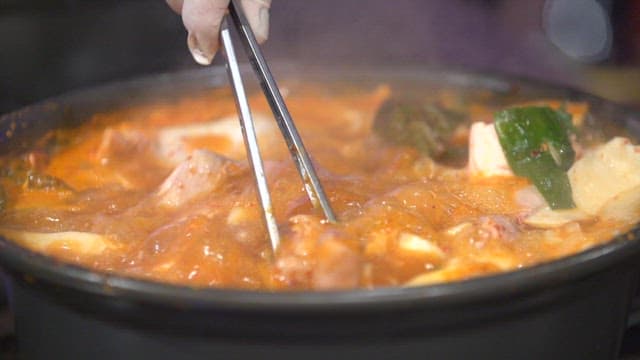 Spicy chicken hotpot boiling in a pot