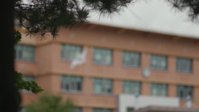 School Building with Korean Flag Fluttering