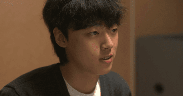 Side profile of smiling young man