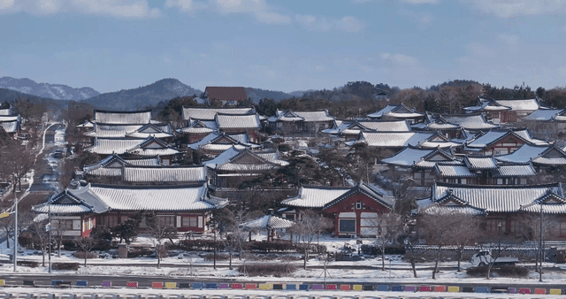 Snow-covered traditional Hanok village
