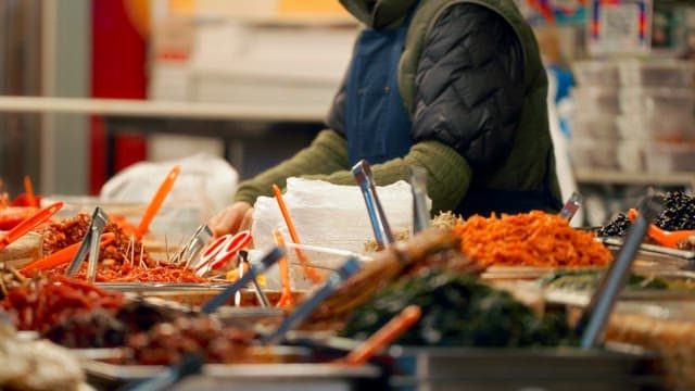 Market stall with various Korean side dishes