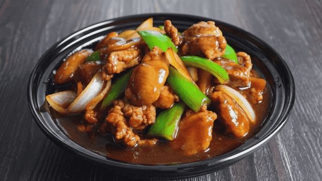 Sweet and sour chicken stir-fried with vegetables