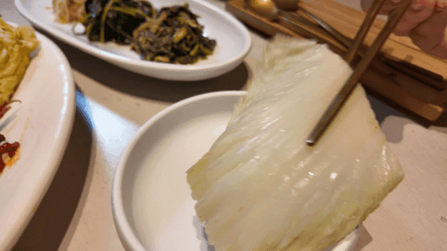 Korean side dishes with fresh vegetables